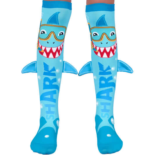 Boy wearing MADMIA sharks socks