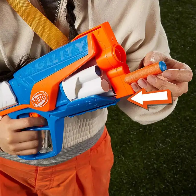 girl reloading darts into nerf gun